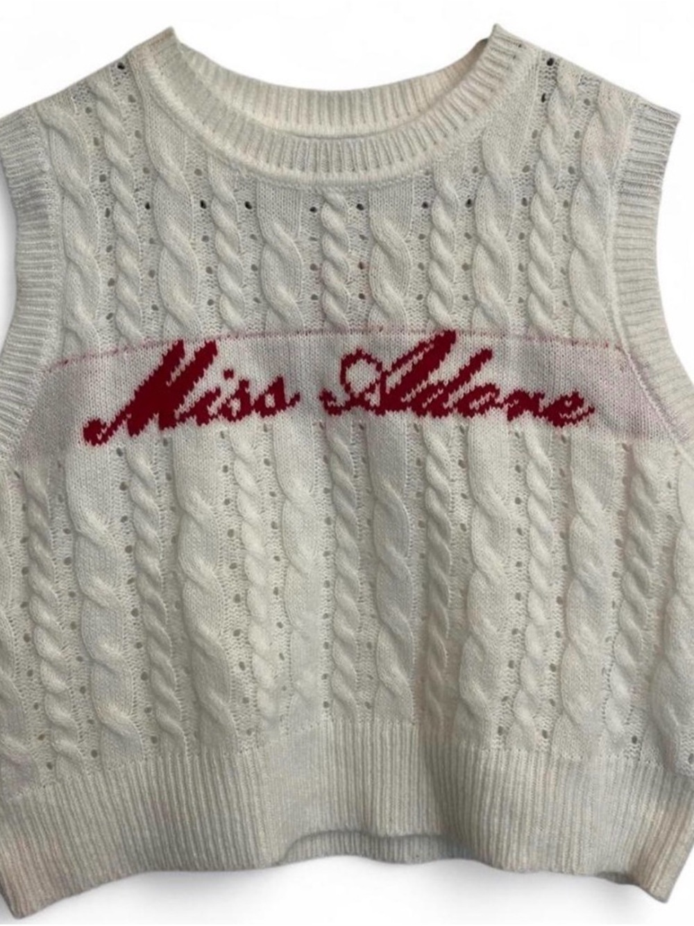 Miss Aligne Cable Knit Sleeveless Sweater Vest in Cream with Red Logo